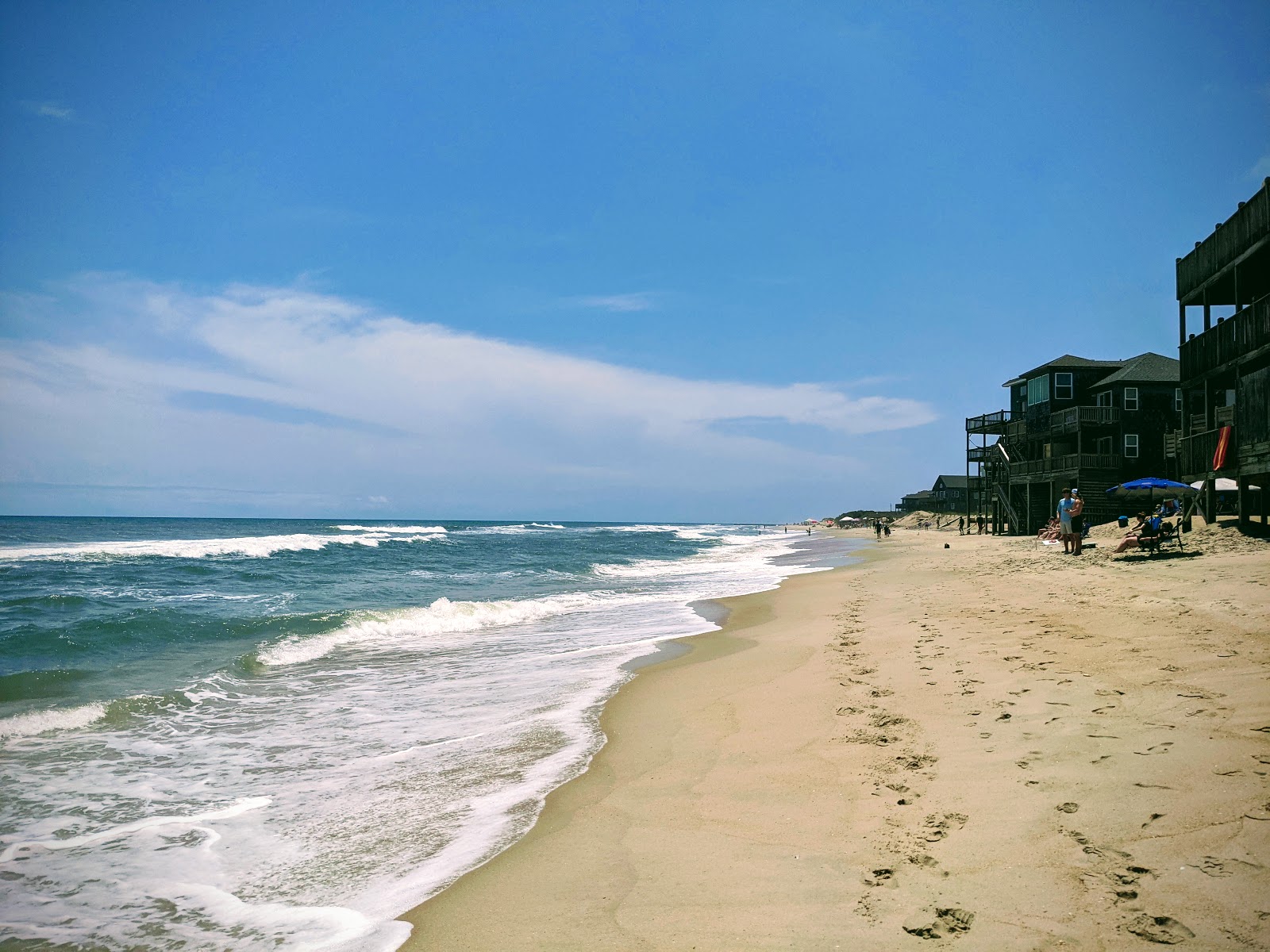 Foto van Old Lighthouse beach met turquoise puur water oppervlakte