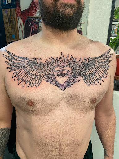 Find skull tattoo ideas for females for your next unique tattoo in Boulder at Claw and Talon Tattoo