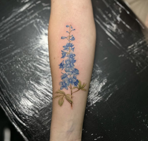 Explore snowboard tattoo ideas, creative tattoo ideas in Peoria, available at Modern Ink Tattoo