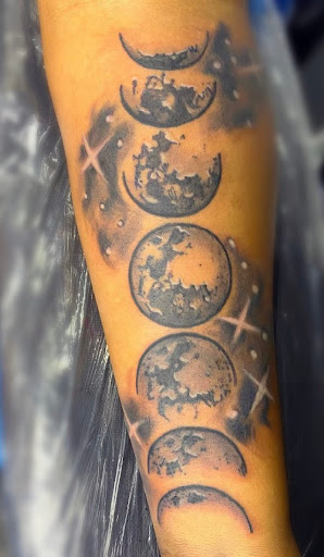 Explore e.t. tattoo ideas, creative tattoo ideas in Atlanta, available at Iron Palm Tattoos & Body Piercing Atlanta