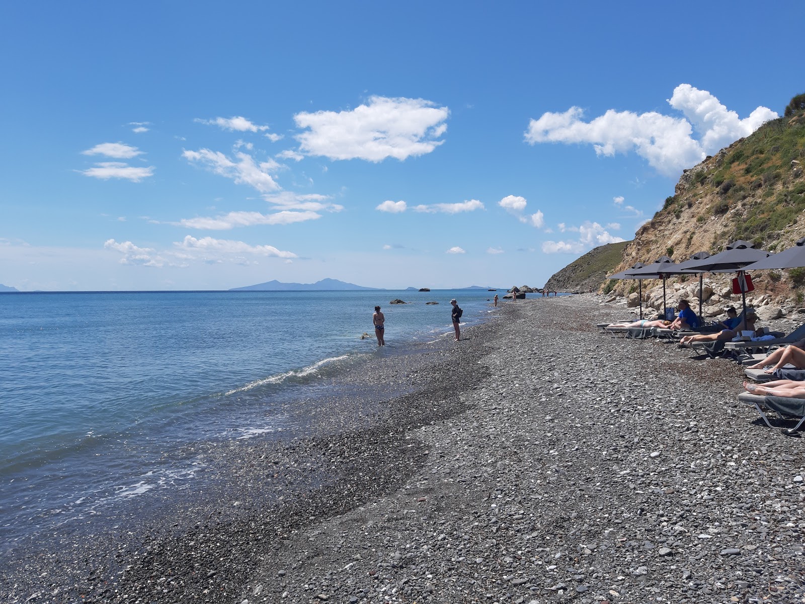 Valokuva Agios Fokas Kosista. pinnalla turkoosi puhdas vesi:n kanssa