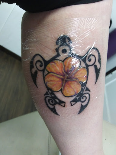 Explore knee cap tattoo ideas for men, creative tattoo ideas in Wenatchee, available at Rebels Tattoo Studio