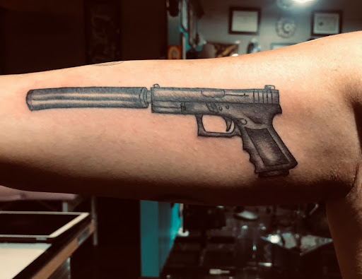 Explore jawline tattoo ideas, creative tattoo ideas in Webster, available at Mainline Ink