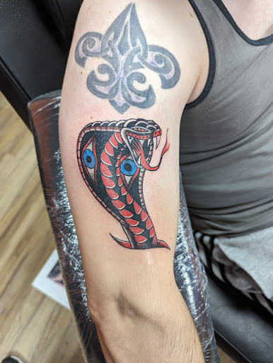 Explore irish cross tattoo ideas, creative tattoo ideas in Mesa, available at Ranger Tattoo & Piercing