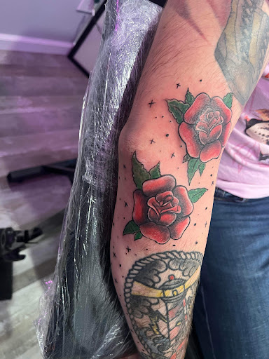 Explore female calf tattoo ideas, creative tattoo ideas in Corning, available at Manifest Studios
