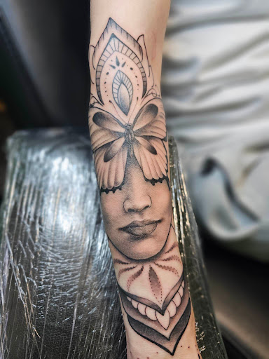 Explore cross tattoo idea, creative tattoo ideas in Galena, available at Emerald Buddha Tattoo