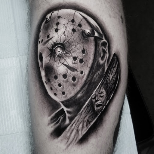 Explore guns and roses tattoo ideas, creative tattoo ideas in Fayetteville, available at Sacred Raven Tattoo Shop