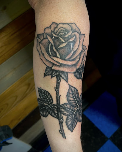 Explore tattoo ideas graffiti, creative tattoo ideas in Talbott, available at Alpha Tattoo co.