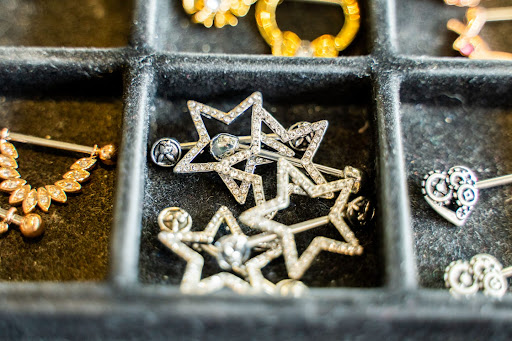 Explore mens wedding ring tattoo ideas, creative tattoo ideas in Charleston, available at Exotic Impressions Body Piercing