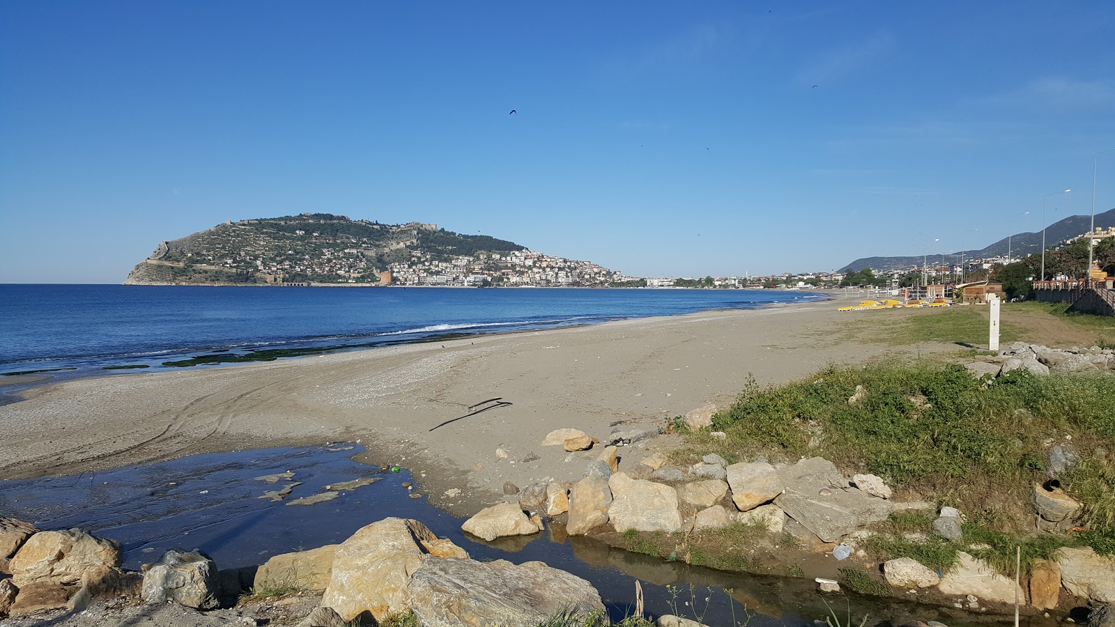 Fotografija Portakal beach in naselje