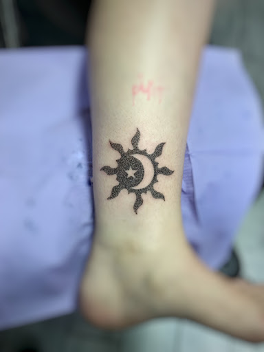 Explore resilience symbol tattoo ideas, creative tattoo ideas in Carmel, available at Phong Tattoo