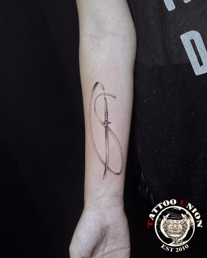 Explore cross tattoo ideas forearm, creative tattoo ideas in Chicago, available at TATTOO UNION CHICAGO