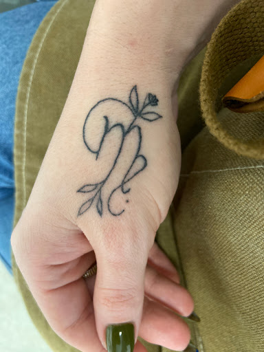 Explore cover up tattoo ideas for lower back, creative tattoo ideas in Indian Trail, available at Beauty in the ink, LLC