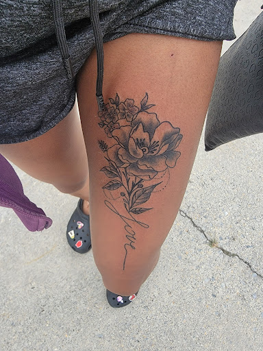 Explore butterfly spine tattoo ideas, creative tattoo ideas in Martinsburg, available at Black Heart Tattoo Gallery