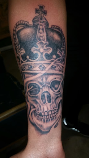 Explore mens ring tattoo ideas, creative tattoo ideas in Odessa, available at Little Dragon Tattoos Studio
