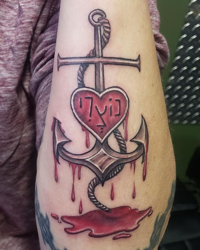 Explore infinity symbol tattoo ideas, creative tattoo ideas in Hoschton, available at The Golden Mantis Tattoo & Piercing