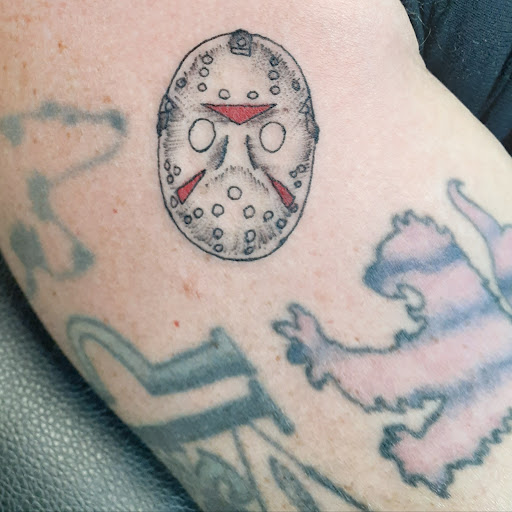 Explore photography tattoo ideas, creative tattoo ideas in Atlanta, available at Atlanta Ink Tattoo and Piercing