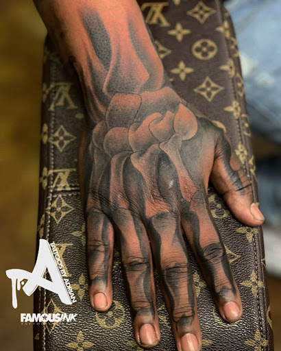 Explore love and war tattoo ideas, creative tattoo ideas in Hammond, available at Famous Ink, Inc.