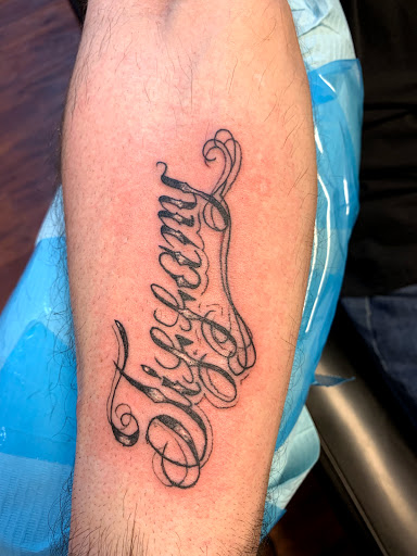 Explore quarter size tattoo ideas, creative tattoo ideas in Seymour, available at American Gypsy Tattoo Corp.