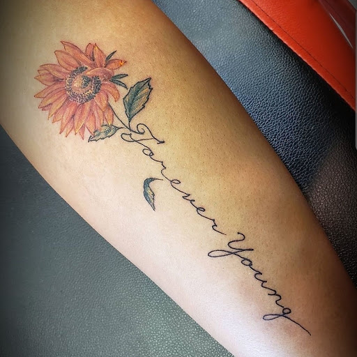 Explore woodstock tattoo ideas, creative tattoo ideas in Ambler, available at Tattoo GalaxyAmbler Piercing & Custom Tattoos