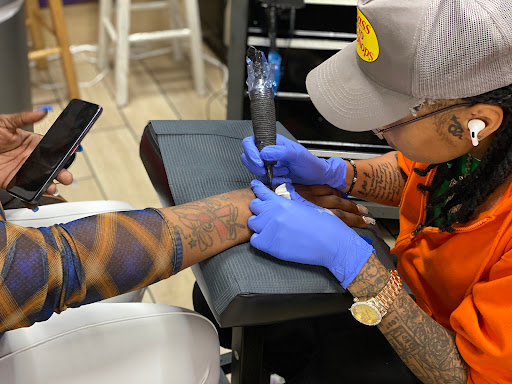 Explore word tattoo ideas for guys, creative tattoo ideas in Houston, available at Orlandos Tattoo Studio