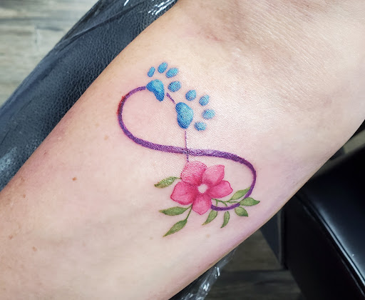 Explore matching tattoos for father and son ideas, creative tattoo ideas in Knoxville, available at Archangel Custom Ink Tattoo & Piercing