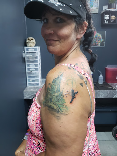 Explore women's half sleeve tattoo ideas, creative tattoo ideas in Foley, available at Symbolic Ink Tattoo Studio