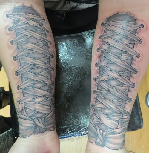 Explore fourth wing tattoo ideas, creative tattoo ideas in Powell, available at AVALON COVE TATTOO