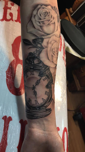 Explore throat tattoo ideas, creative tattoo ideas in Modesto, available at Young Guns Tattoo Studio