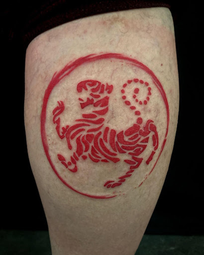 Explore anime neck tattoo ideas, creative tattoo ideas in Corona, available at Crop Circles Tattoo Studio