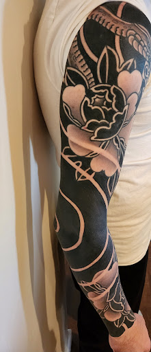 Explore half sleeve tattoo sleeve ideas, creative tattoo ideas in Tuscola, available at Vintage Karma