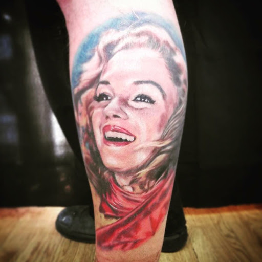 Explore throat tattoo ideas, creative tattoo ideas in Fort Pierce, available at Goodfellas Tattoo & Body Piercing