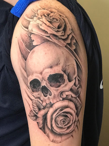 Explore red string of fate tattoo ideas, creative tattoo ideas in High Point, available at 21 Aces Tattoo Co.