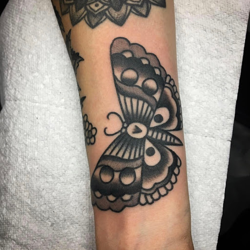 Explore doom tattoo ideas, creative tattoo ideas in Warrenville, available at UpRise Tattoos