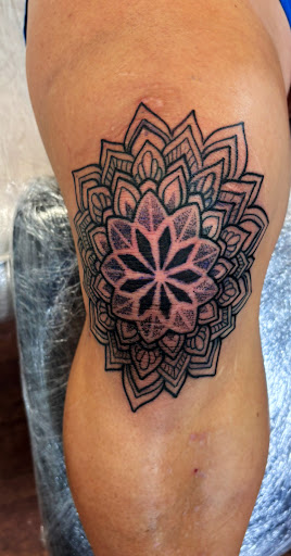 Explore collarbone tattoo ideas for men, creative tattoo ideas in Rogers, available at Ink Solutions Tattoo