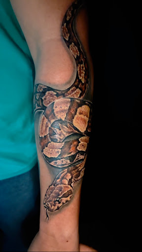 Explore ironman tattoo ideas, creative tattoo ideas in Titusville, available at Space Coast Ink Tattoo Studio
