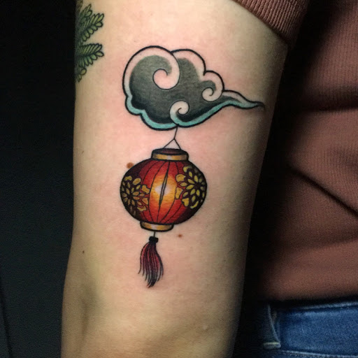 Explore ear tattoos ideas, creative tattoo ideas in Edgewood, available at Evolved Body Arts