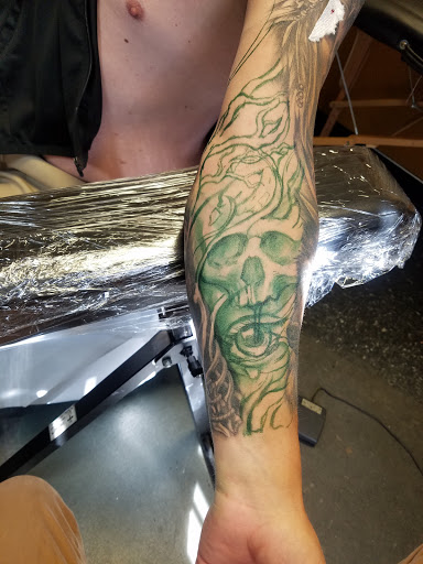 Explore wind tattoo ideas, creative tattoo ideas in Chattanooga, available at Standard Ink Tattoo Co