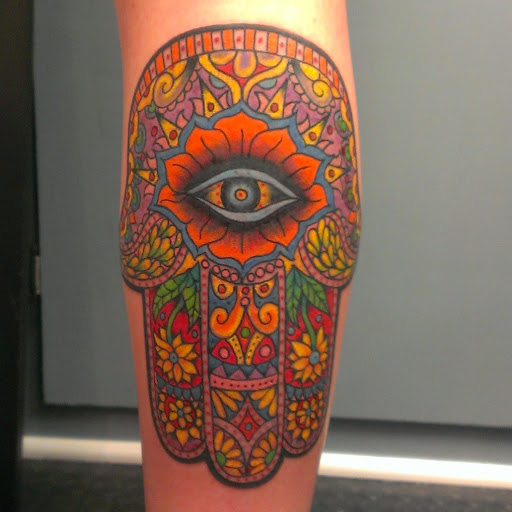 Explore grim reaper sleeve tattoo ideas, creative tattoo ideas in Cincinnati, available at Tattoo Makers