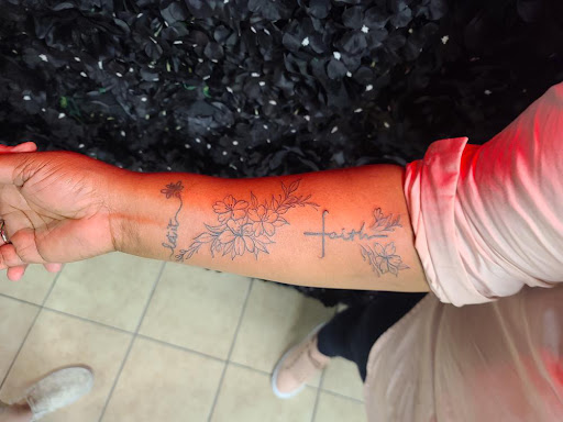 Explore flower ankle tattoo ideas, creative tattoo ideas in Houston, available at 333 Tattoo Studio HTX