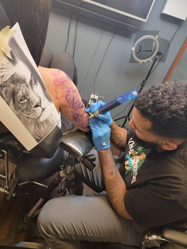 Explore salmon tattoo ideas, creative tattoo ideas in Fort Wayne, available at Grade A Tattoos and Body Piercing