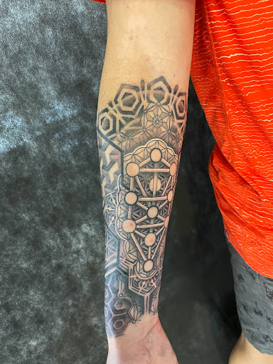 Explore good tattoo ideas for sleeves, creative tattoo ideas in Sarasota, available at SEVEN SINS Tattoo Studio