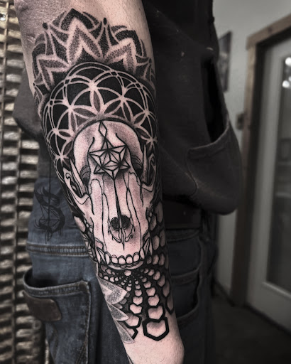 Explore unique tramp stamp tattoo ideas, creative tattoo ideas in Lopez Island, available at Soot and Bone Body Art Studio