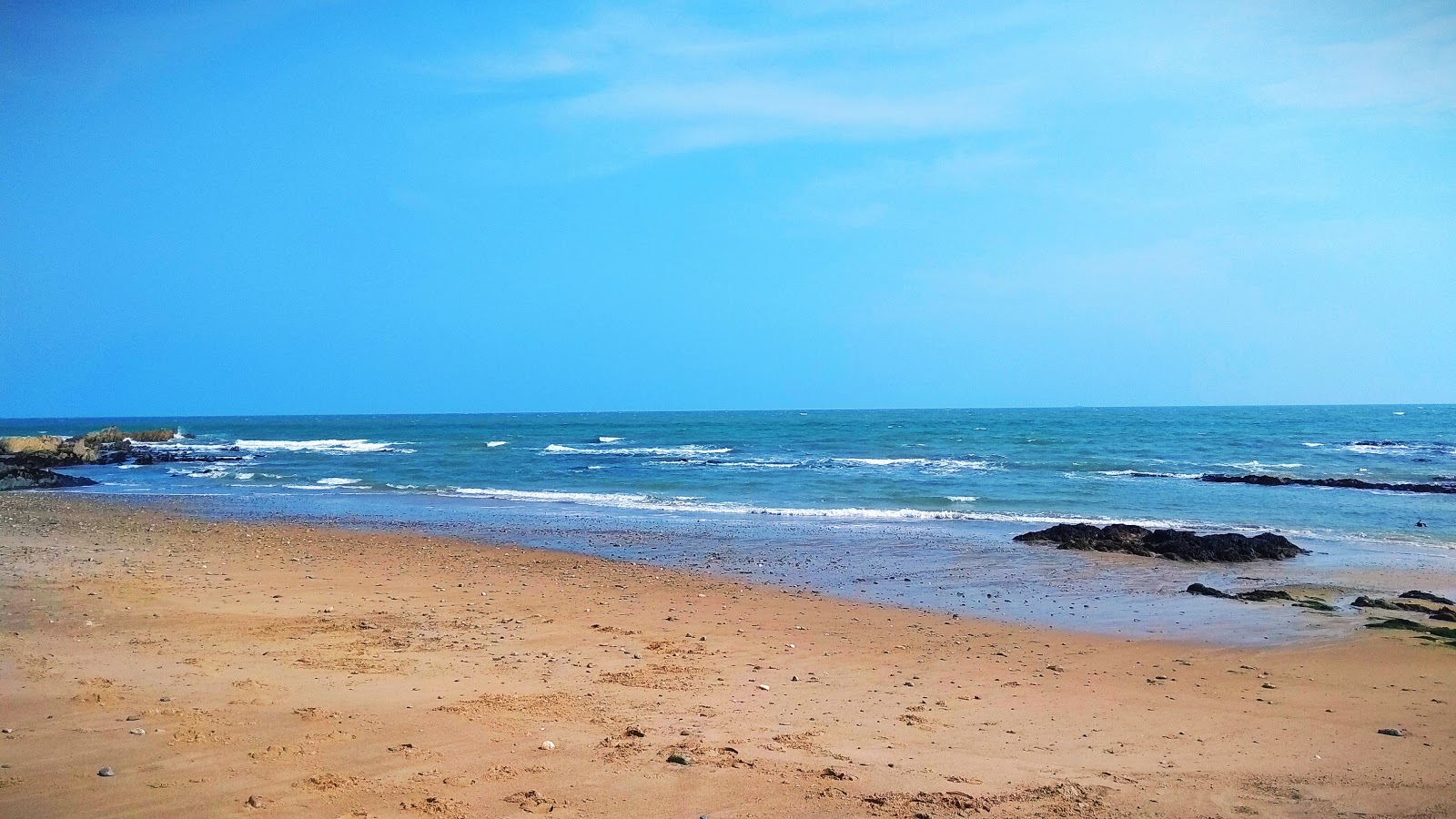 Foto av Oldmill Bay Beach med turkos rent vatten yta