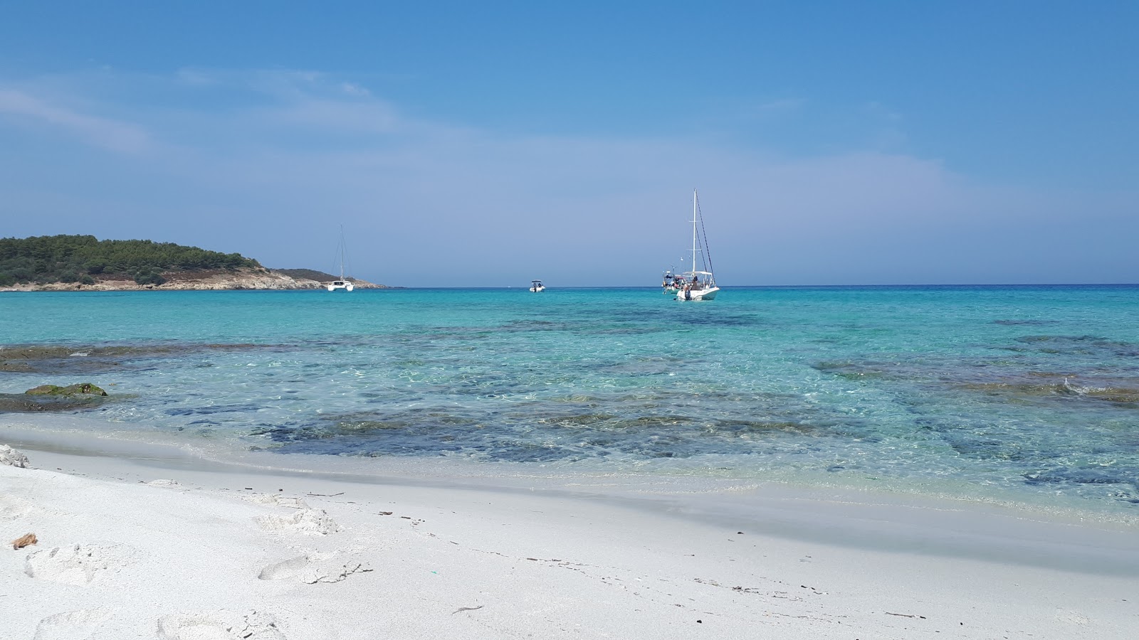 Photo of Trave beach with turquoise pure water surface