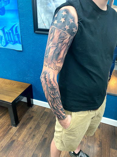 Explore smile tattoo ideas, creative tattoo ideas in Martin, available at Southern Ink Tattoos & Piercings