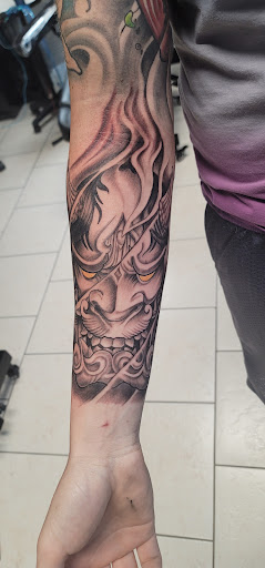 Explore car tattoo ideas, creative tattoo ideas in Ocoee, available at Slaughterized Ink Tattoo and Piercing Studio