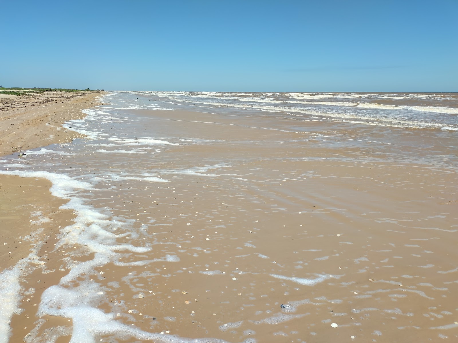 Foto di Sargent beach con una superficie del sabbia grigia