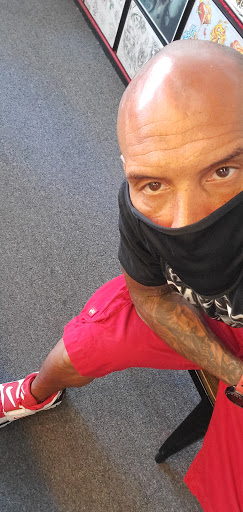 Explore archery tattoo ideas, creative tattoo ideas in Tucson, available at Enchanted Dragon