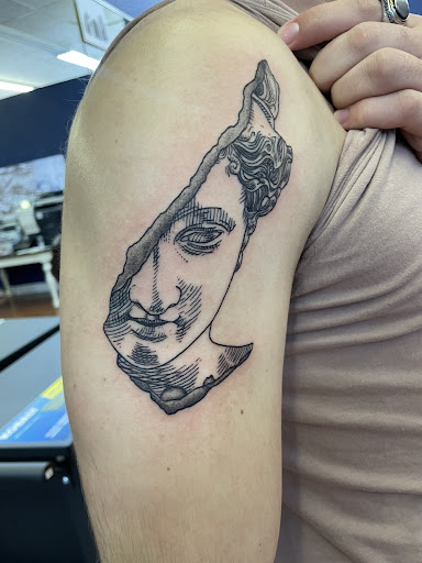 Explore next tattoo idea, creative tattoo ideas in Cocoa, available at Rorschach Tattoo Shop and Piercing Studio